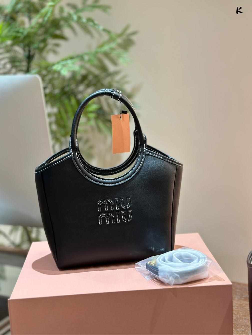 MIUMIU Leather tote hand bag
